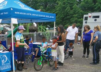 Giving bikes away at the Healthy Living KC Fair