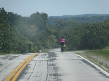 People who bicycle on public roads in Missouri are affected by loose dogs