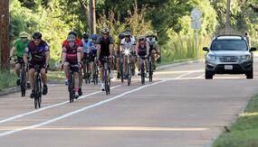 Cyclists on the new Lockwood Ave bicycle lane (credit: Webster-Kirkwood Times)