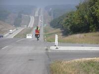 Bicyclist on MoDOT highway