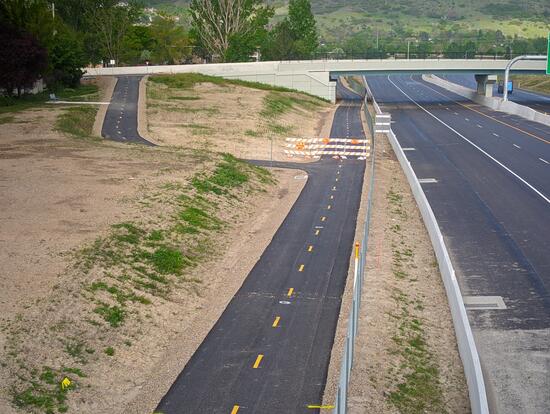 Bike path a long a new multi-lane divided highway Bike path a long a new multi-lane divided highway